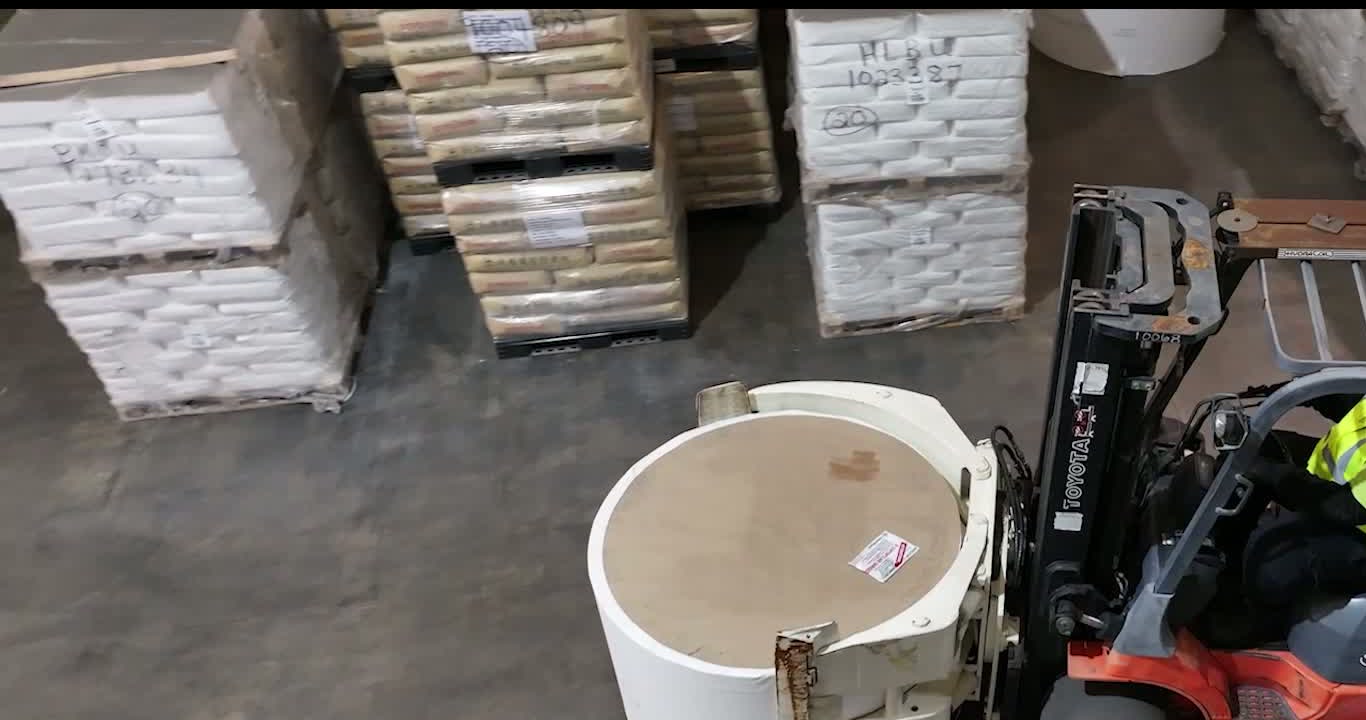 Full forklift moving bulk freight inside Carroll's Norfolk warehouse